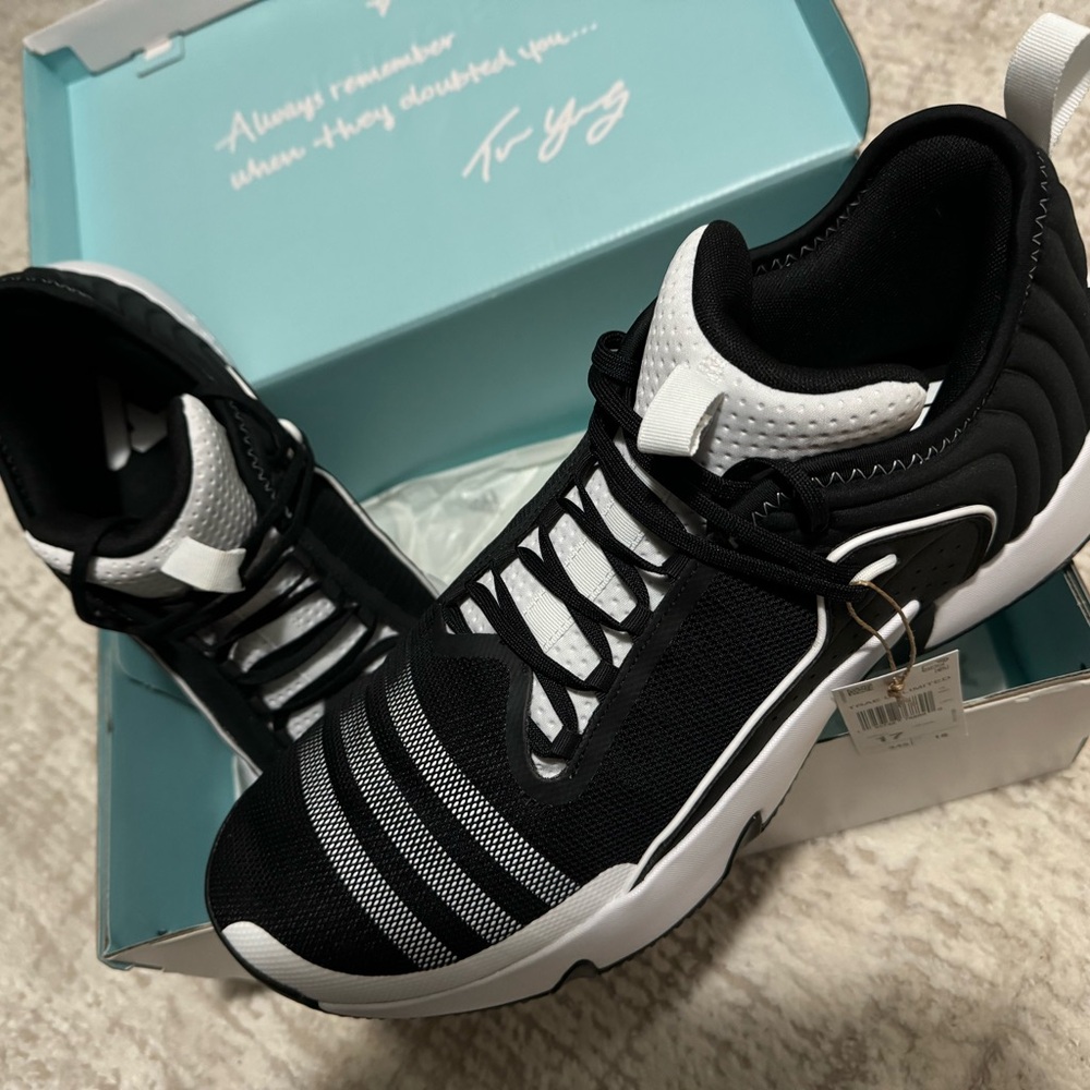 Adidas’s Trae Unlimited. Men size 17
